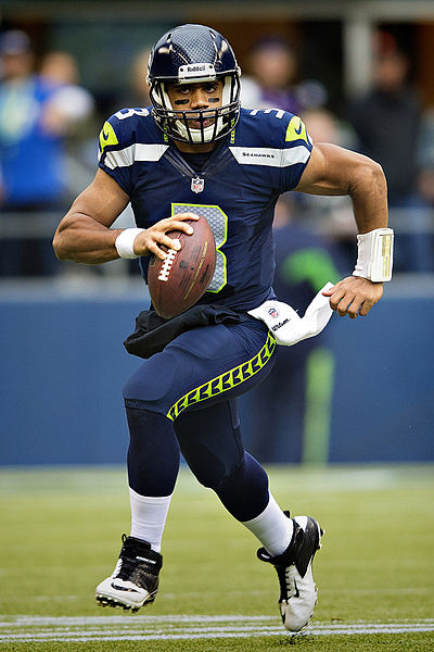 Russell Wilson defied expectations and helped launch the Seahawks into the playoffs. By Larry Maurer [CC-BY-2.0 (http://creativecommons.org/licenses/by/2.0)], via Wikimedia Commons
