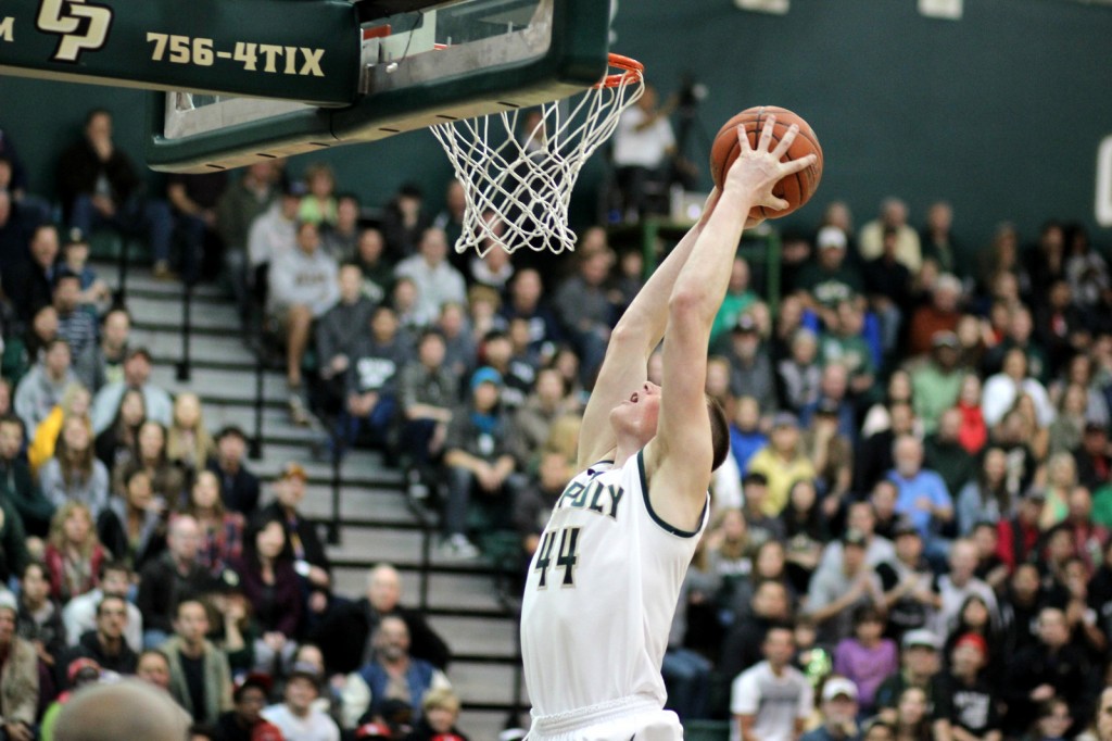 Cal Poly freshman Zach Gordon goes up for a dunk during Cal Poly's win on Saturday night. By Owen Main