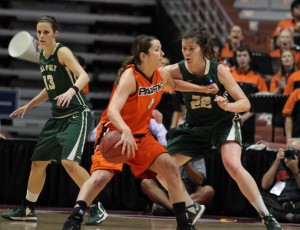 Seniors Nikol Allison (13) and Caroline Reeves (22) had big contributions in Cal Poly's first-ever Big West Tournament Championship. By Owen Main