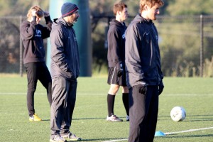 Paul Holocher looks on during spring practice this week. By Owen Main