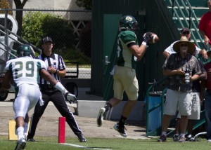 Sam Holquin catches the first touchdown of the Spring Game from Tanner Trosin. By Owen Main