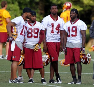 If you go to Redskins training camp, you might see a bunch of players standing around like this not signing autographs. It would be OK to not cry about it. By Keith Allison from Owings Mills, USA, via Wikimedia Commons