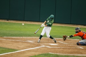 Peter Van Gansen triples to drive home Cal Poly's first run on Friday night. By Owen Main