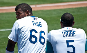 Puig needs players like Uribe to show him the way and teach him. By Ron Reiring [CC-BY-2.0 (http://creativecommons.org/licenses/by/2.0)], via Wikimedia Commons