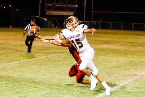 Mission Prep junior, Matthew Bosshardt tips the ball twice to himself before pulling in the catch on Friday night. By Owen Main