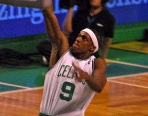 Rajon Rondo should trade in his green and white jersey for a purple and gold one. By Rondo_Dunks.jpg: Eric Kilby derivative work: El cestofilo (This file was derived from:  Rondo_Dunks.jpg) [CC-BY-SA-2.0 (http://creativecommons.org/licenses/by-sa/2.0)], via Wikimedia Commons