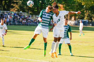 Cal Poly's Kaba Alkebulan battles for an arial ball on Saturday afternoon in Sacramento. By Owen Main