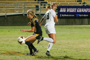This Sara Lancaster effort made it to goal, but was saved by the Long Beach State keeper. by Owen Main