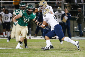 Cal Poly's Nick Dzubnar had 18 tackles, but not enough of them were at or near the line of scrimmage. By Owen Main