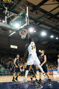 Mamadou Ndiaye's (No. 34) offensive skillset is limited to reaching over opponents and dunking the basketball, but his defense makes him a valuable asset to the team. (Photo taken by Albert Halim)