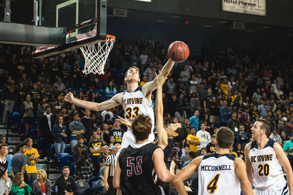 Mike Best (No. 33) swats emphatically to preserve Irvine's enormous lead in the second half. 