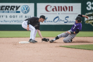 Ryan Droby applies the tag as a would-be Grand Canyon base-stealer is thrown out by catcher Jake Lesinski. The "strike-em-out, throw-em-out double-play was one of three that Cal Poly turned on Sunday afternoon. By Owen Main