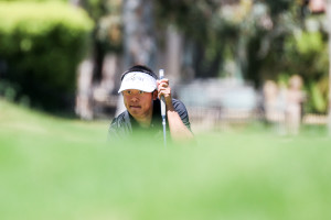 Justin De Los Santos stares down a put on his way to the Big West Championship. By Owen Main