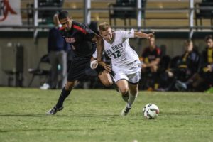 Despite the cast on his right wrist, Kenneth Higgins has provided a lot of energy and ball control for a Cal Poly team that is still looking to find its identity. By Owen Main